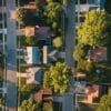 top view of homes with streets and trees no text no lettering