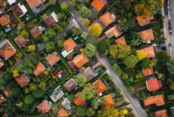 top view of homes with streets and trees no text no lettering